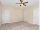 Neutral bedroom with three doors and carpeted floors at 2324 Bonterra Blvd, Indian Trail, NC 28079