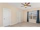 Cozy bedroom with ample natural light from the window and neutral carpeting at 2324 Bonterra Blvd, Indian Trail, NC 28079