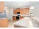 Bright kitchen with stainless steel appliances, wood cabinets, and ample counter space at 2324 Bonterra Blvd, Indian Trail, NC 28079