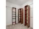 A spacious walk-in closet with built-in shelving, carpeted floor, and metal closet rods at 2324 Bonterra Blvd, Indian Trail, NC 28079