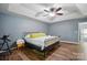 Large primary bedroom with tray ceilings and great natural light from the large window at 2426 Tory Oak Pl, Matthews, NC 28105