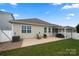 Back of home showing large patio area perfect for outdoor relaxation and entertaining at 274 Robinwood Ln, Lake Wylie, SC 29710