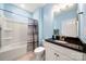 Bright bathroom with granite countertops, a spacious vanity, and a tub with a shower at 274 Robinwood Ln, Lake Wylie, SC 29710