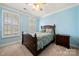 Cozy bedroom features neutral carpet, natural light from the window, and traditional furnishings at 274 Robinwood Ln, Lake Wylie, SC 29710