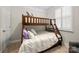 Bedroom with a wooden bunk bed, carpet, and natural light from the window at 274 Robinwood Ln, Lake Wylie, SC 29710