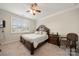 Relaxing bedroom featuring neutral carpet, natural light from the window, and traditional furnishings at 274 Robinwood Ln, Lake Wylie, SC 29710