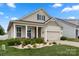 Charming single-Gathering home with a well-maintained lawn, inviting curb appeal, and an attached two car garage at 274 Robinwood Ln, Lake Wylie, SC 29710