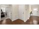 Hallway featuring hardwood floors and access to bedrooms at 274 Robinwood Ln, Lake Wylie, SC 29710