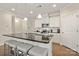A lovely kitchen features stainless steel appliances, granite countertops, and a breakfast bar at 274 Robinwood Ln, Lake Wylie, SC 29710