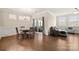Living room featuring hardwood floors, dining area, neutral paint and a sliding glass door at 274 Robinwood Ln, Lake Wylie, SC 29710