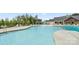 Beautiful community pool with sun loungers, fountain feature, and a nearby pool house at 274 Robinwood Ln, Lake Wylie, SC 29710