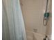 Neutral bathroom featuring a shower and tub combo with a patterned shower curtain at 2800 Patio Ln, Gastonia, NC 28056