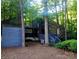 Unique home featuring a combination of stone and siding, surrounded by mature trees at 2800 Patio Ln, Gastonia, NC 28056