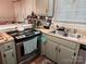 The kitchen features updated appliances, stainless steel double sink, and ample counter space at 2800 Patio Ln, Gastonia, NC 28056