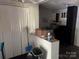 Another view of the kitchen with light walls and dark floors needs work at 2925 Titman Rd, Gastonia, NC 28054