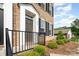 Brick townhome with manicured front yard and inviting front entry at 309 N Aspen St, Lincolnton, NC 28092