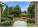 Lush backyard featuring a well-kept lawn and manicured landscaping at 310 Ridge Reserve Dr, Clover, SC 29710