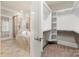 Bathroom featuring tiled shower, soaking tub, and large closet with built-in shelving at 310 Ridge Reserve Dr, Clover, SC 29710