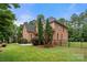 Beautiful brick home with a spacious yard and mature trees at 310 Ridge Reserve Dr, Clover, SC 29710