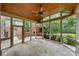 Screened porch with brick fireplace, wood ceiling, tiled floors and views of landscaped backyard at 310 Ridge Reserve Dr, Clover, SC 29710