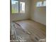 Bright bedroom with new flooring being installed, complemented by natural light at 312 Wesley Heights Way # B, Charlotte, NC 28208