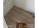 New wood-style flooring adds warmth to this modern bathroom space at 312 Wesley Heights Way # B, Charlotte, NC 28208