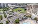 Aerial view of property that highlights stadium, swimming pool, street views, and a vibrant neighborhood at 333 W Trade St # 1500, Charlotte, NC 28202