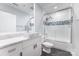 Bathroom featuring a modern vanity, granite countertop, and shower at 333 W Trade St # 1500, Charlotte, NC 28202