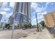 Modern high-rise building showcasing contemporary architecture and streetscape views during the day with blue skies at 333 W Trade St # 1500, Charlotte, NC 28202