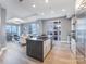 Open concept kitchen with island, stainless appliances, and views at 333 W Trade St # 1500, Charlotte, NC 28202