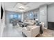 Comfortable living room with large windows showcasing skyline view at 333 W Trade St # 1500, Charlotte, NC 28202