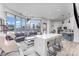 Inviting living space with floor to ceiling windows and open access to the modern kitchen at 333 W Trade St # 1500, Charlotte, NC 28202