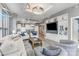 Spacious living area open to kitchen with modern furnishings at 333 W Trade St # 1500, Charlotte, NC 28202