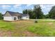 Sprawling backyard features lush green grass and direct access to the home's exterior entrance at 3478 Winters St, Newton, NC 28658