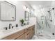 Modern bathroom with a double sink vanity, granite countertop, walk-in shower with glass door, and neutral tones at 3478 Winters St, Newton, NC 28658