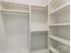 Walk-in closet with custom shelving and ample storage space for clothes, shoes, and accessories at 3478 Winters St, Newton, NC 28658