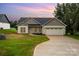 Beautiful single Gathering home featuring a two-car garage, neutral colors, and a landscaped yard with a concrete driveway at 3478 Winters St, Newton, NC 28658