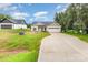 Well-maintained single Gathering home features a manicured lawn, a two-car garage, and neutral siding at 3478 Winters St, Newton, NC 28658