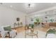 Inviting living room with hardwood floors, modern lighting, and open concept floor plan flowing into the kitchen and dining areas at 3478 Winters St, Newton, NC 28658