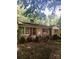 Charming single-story brick home with red shutters and a covered front porch at 3715 Vanderburg Dr, Concord, NC 28025