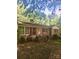 Charming single-story brick home with red shutters and a covered front porch at 3715 Vanderburg Dr, Concord, NC 28025