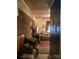 Inviting living room with cozy seating and stylish brick accent wall at 3715 Vanderburg Dr, Concord, NC 28025