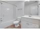 Full bathroom featuring a single sink vanity, toilet, and a shower-tub combo at 3741 Tea Olive Rd, Gastonia, NC 28056