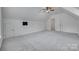Spacious bonus room with neutral carpet, white walls, and vaulted ceiling at 3741 Tea Olive Rd, Gastonia, NC 28056