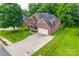 Beautiful brick home featuring an attached two-car garage and a manicured front lawn at 3741 Tea Olive Rd, Gastonia, NC 28056