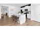 Kitchen with island, granite countertops, stainless appliances, and modern stools at 3940 Ashton Nw Dr, Conover, NC 28613