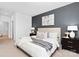 Modern main bedroom features a cozy color palette, plush bedding, and side tables at 3940 Ashton Nw Dr, Conover, NC 28613