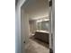 Well-lit bathroom featuring dual sinks, a bathtub/shower, and modern finishes at 4029 Port Richmond Ave # 6, Gastonia, NC 28056