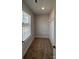 Walk-in closet with carpeted floors, shelving, and a bright window for natural light at 4029 Port Richmond Ave # 6, Gastonia, NC 28056