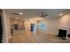 Modern living area featuring hardwood floors, neutral paint, and seamless flow to the kitchen for easy entertaining at 4029 Port Richmond Ave # 6, Gastonia, NC 28056
